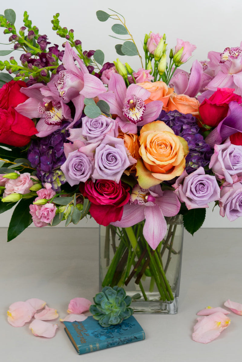 hot pink roses lisianthus hydrangea orchids in a very large romantic wow factor bouquet