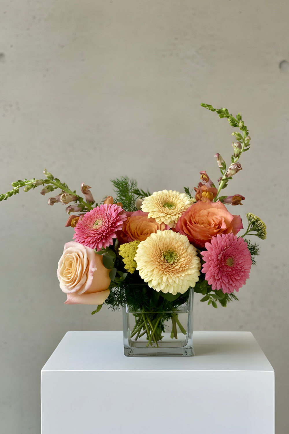 peach, pink, yellow flower bouquet perfect for summer birthday bouquet gift giving in castle rock.