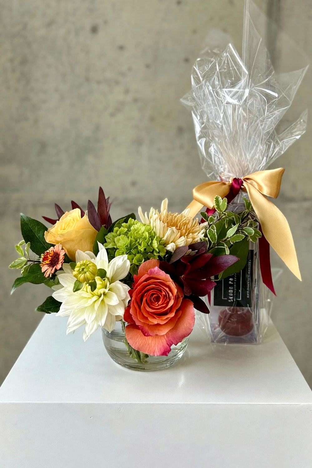 Autumn Bloom &amp; Bite Box gift set with fall bouquet and macaron sampler, ready for gifting