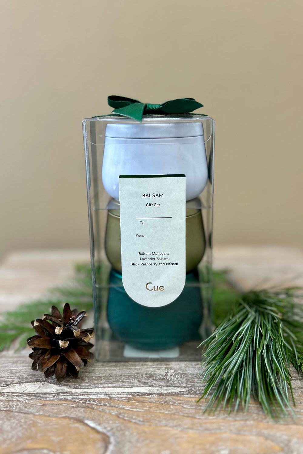 Balsam Candle Gift Set by Cue with three 3.5oz tins featuring Balsam Mahogany, Lavender Balsam, and Black Raspberry &amp; Balsam