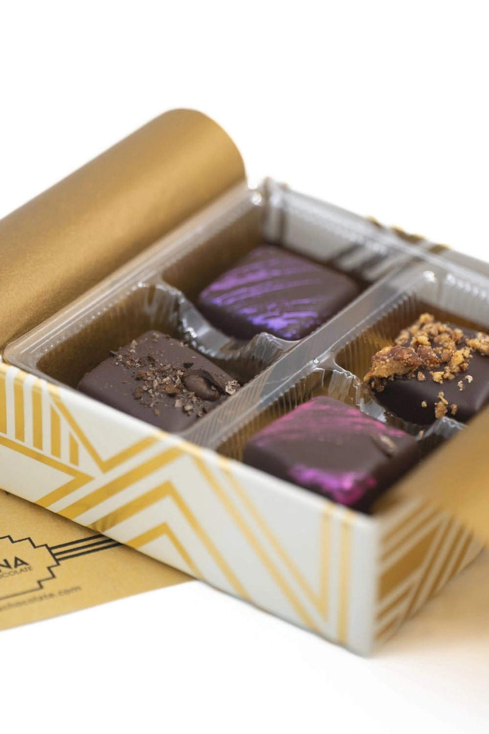 4 piece chocolate truffles in beautiful gold box