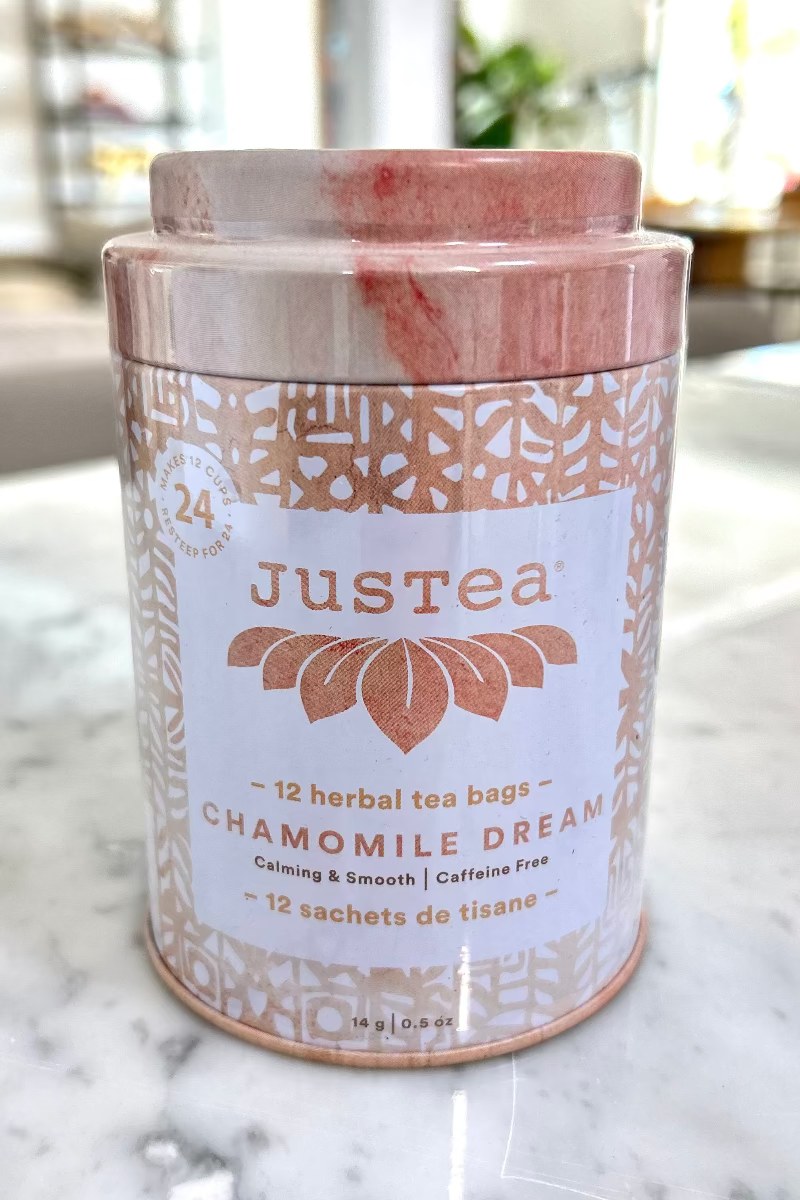 close up image of chamomile dream tea tin