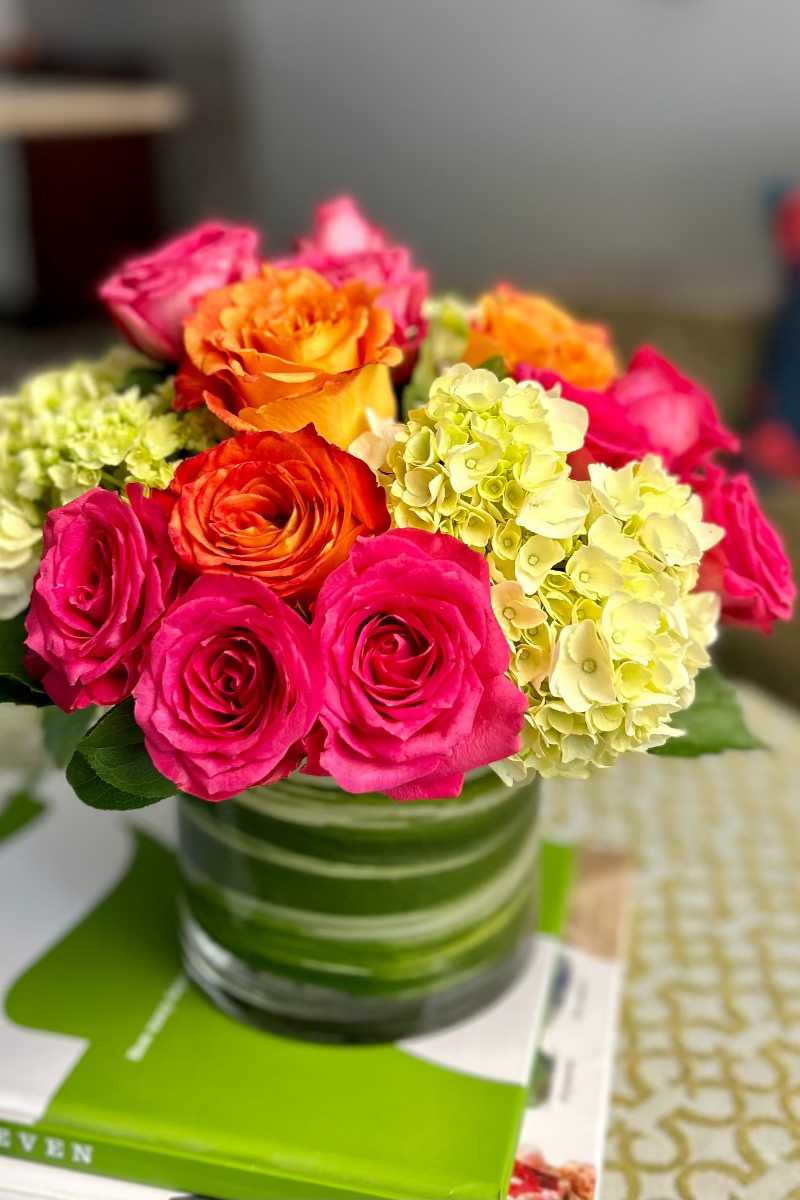 bright bouquet styled on a coffee table