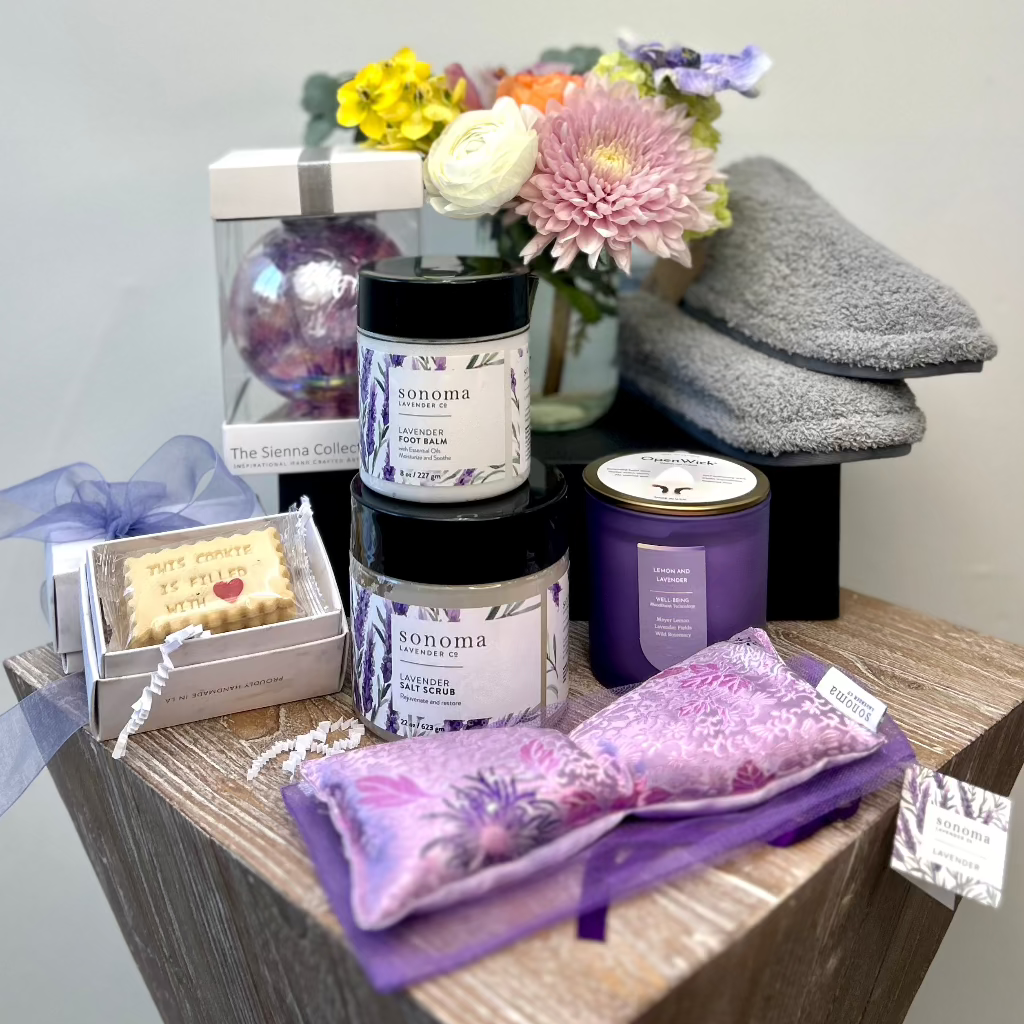 lavender-themed wellness gift set featuring flowers,spa essentials,and cozy treats-perfect for thoughtful giving.