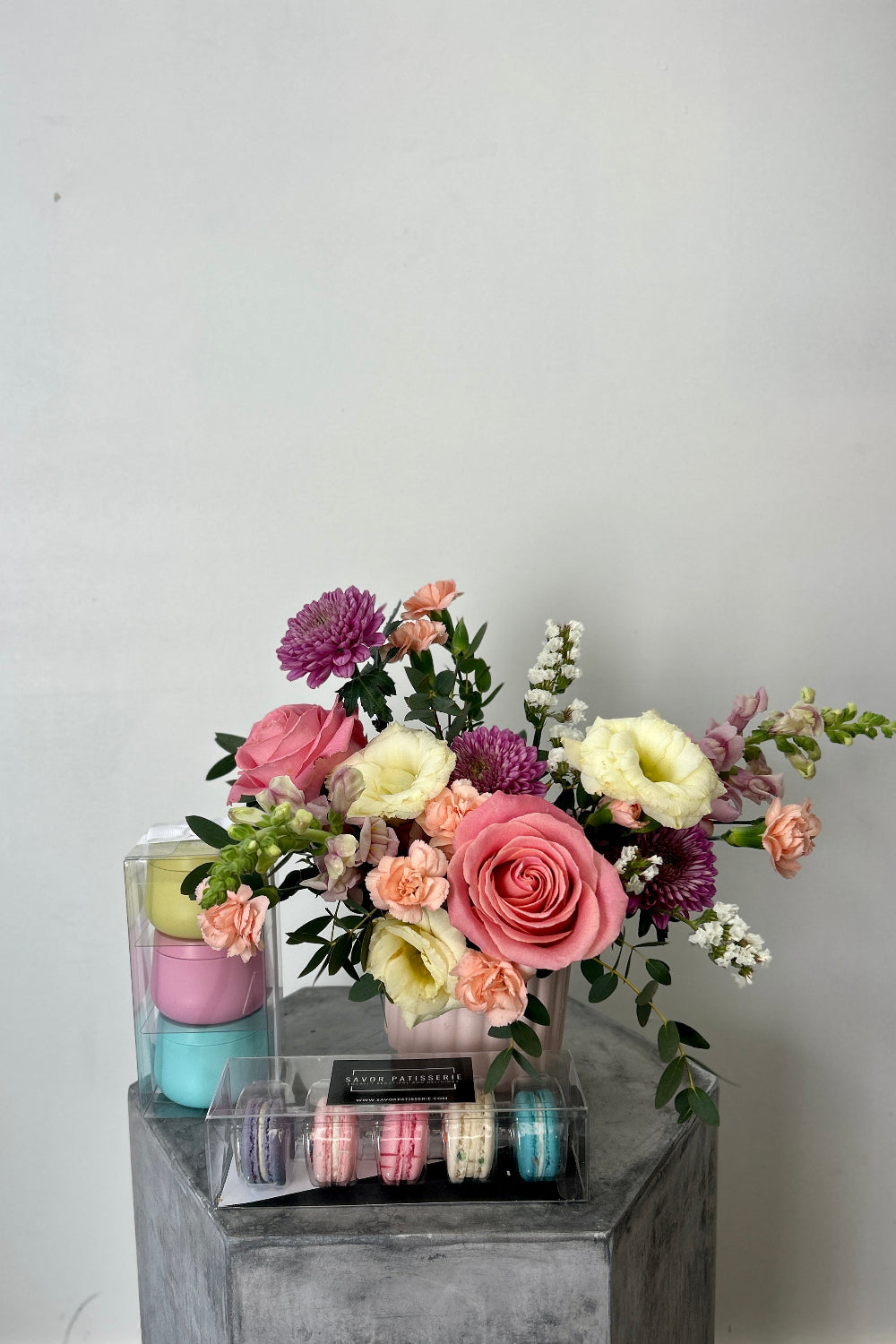 Pastel Springtime Gift Set with pastel spring bouquet, unicorn macarons, and pastel candles