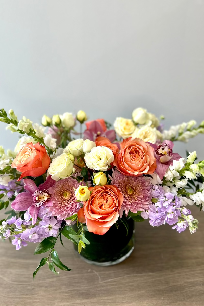 Close-up of pastel roses and lisianthus showing soft texture and movement