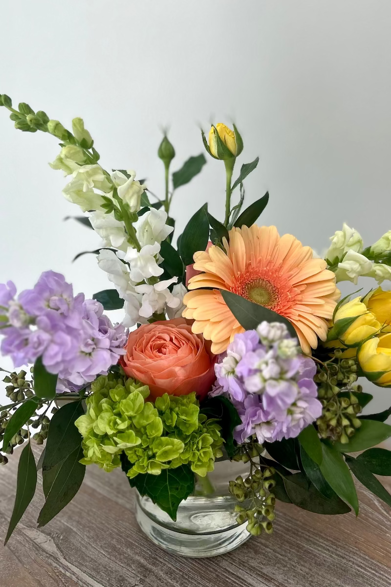 Pastel Blooms arrangement in delivery wrap—hand-delivered with care to Lone Tree Hospitals