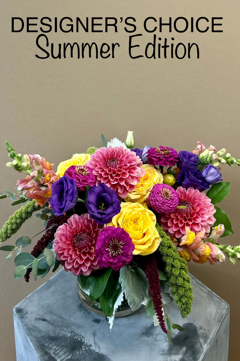Colorful flower arrangement from the Designer's Choice Summer Edition option filled with gorgeous summer flowers ready to be delivered in lone tree colorado