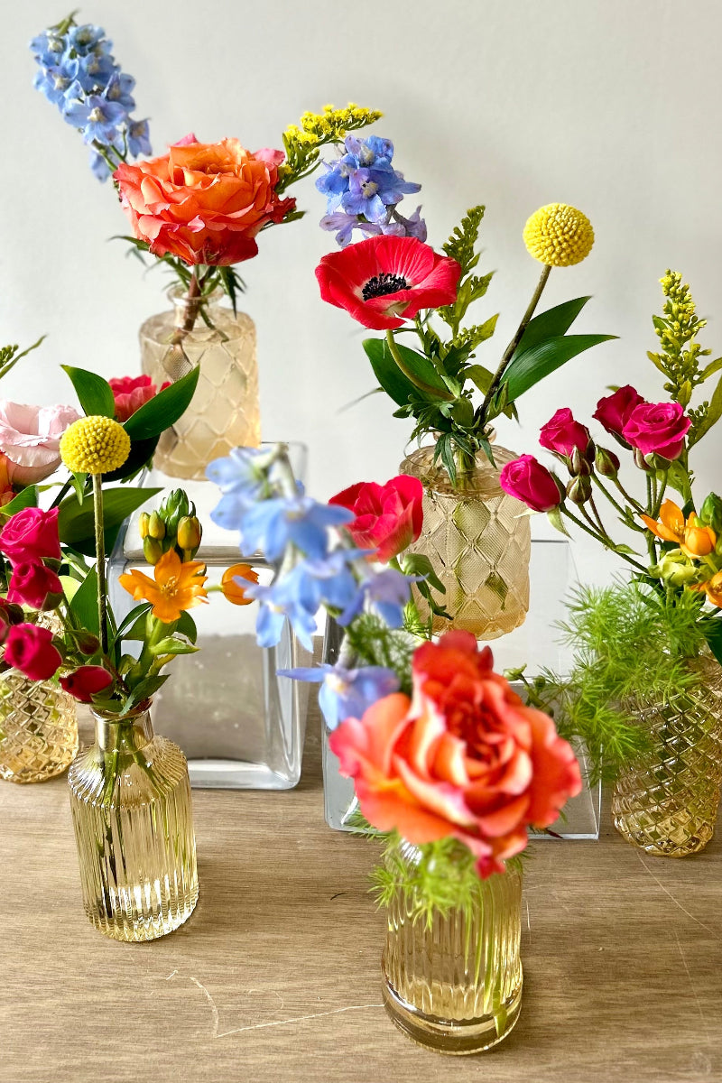 Colorful summer flower arrangements in bud vases instant party decor for summer parties in lone tree colorado
