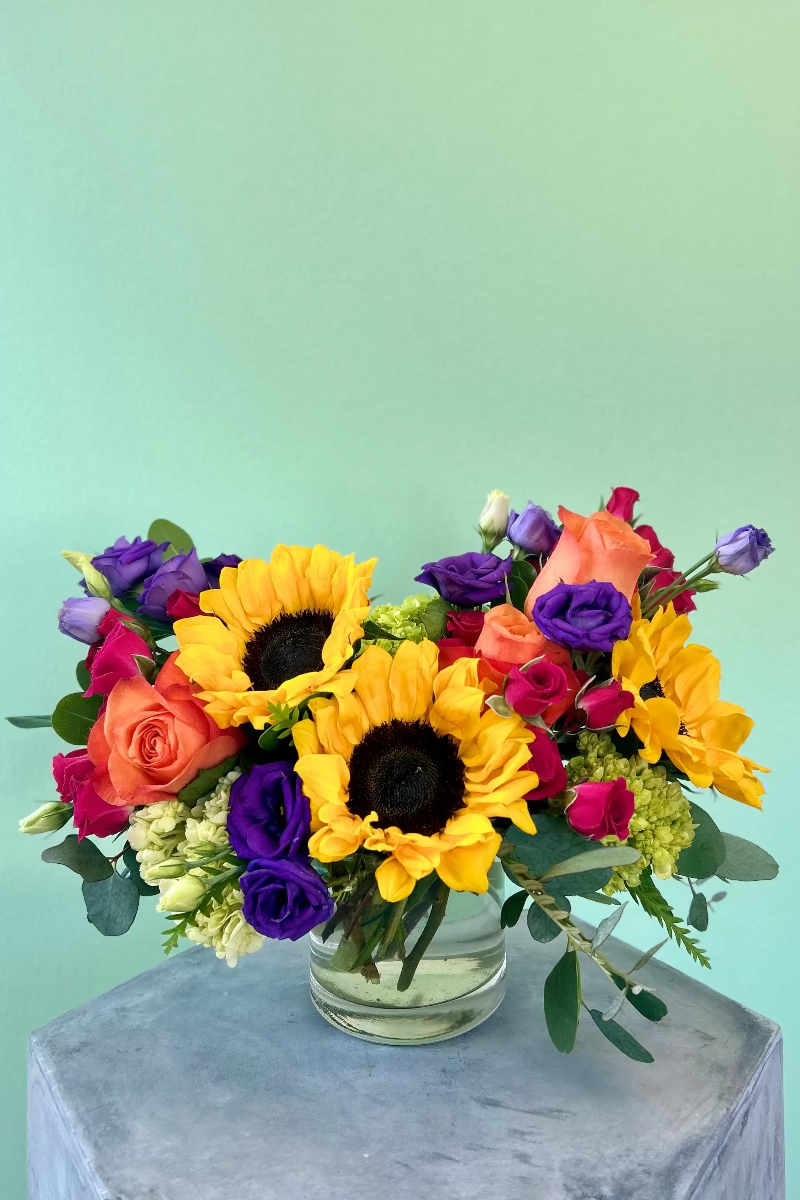 Close-up of vivid blooms showing layered texture and Bright &amp; Joyful palette