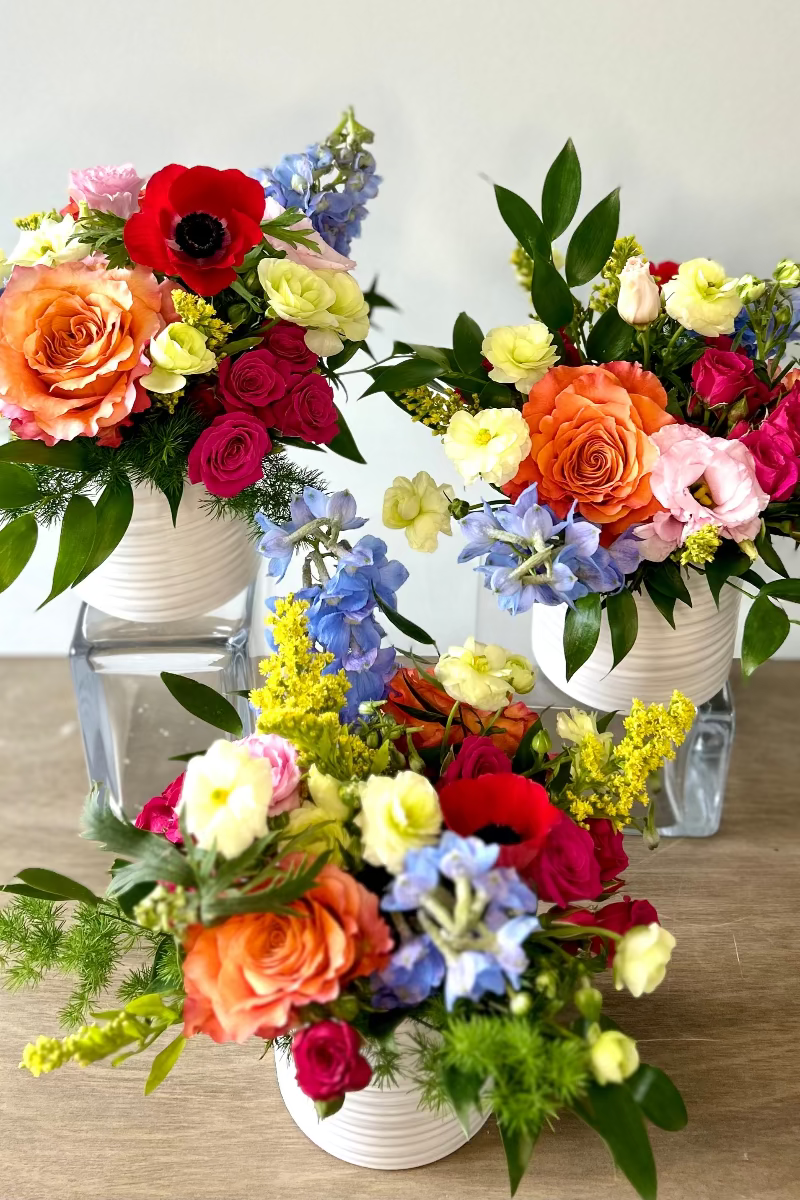 Three colorful summer flower bouquets perfect for gifting for birthdays or a hostess gift or for instant party decor designed by woman owned castle pines flower studio