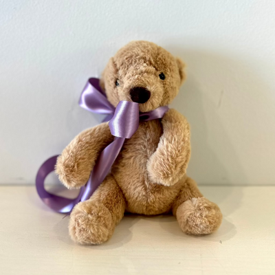 light-brown-teddy-bear-lavender-ribbon