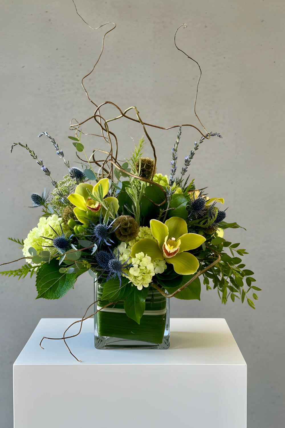 An upgraded, fuller version of the Colorado Forest &amp; Flame bouquet with added branches, succulents, and textured greenery.
