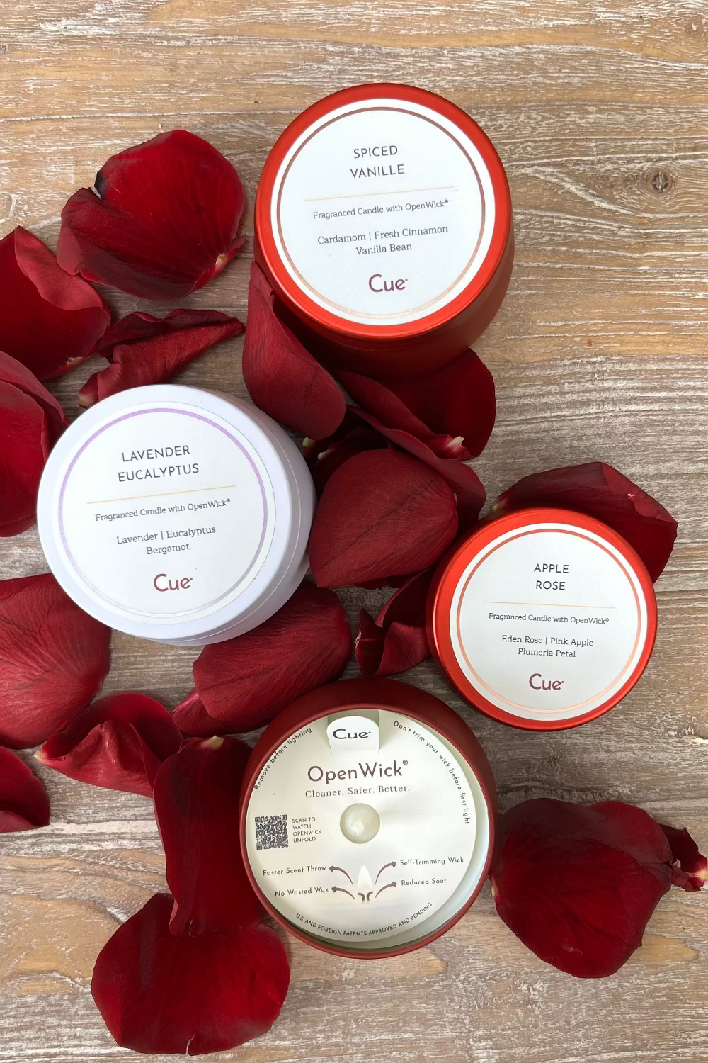 Close‑up of Cue Xoxo Candle Gift Set showing tin detail and OpenWick™ technology