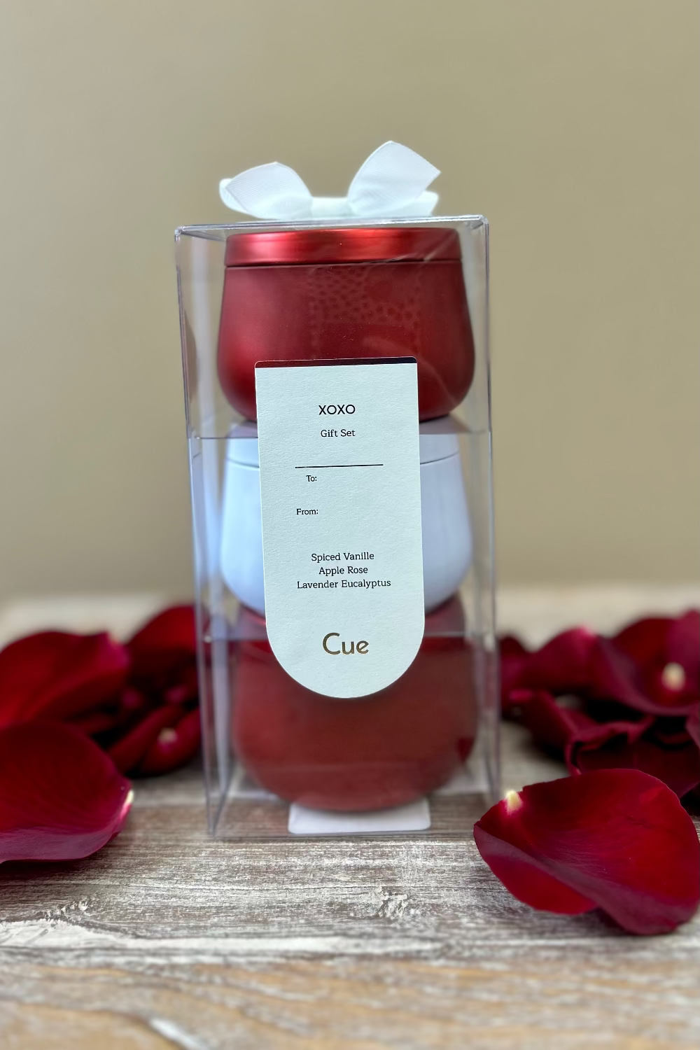 Xoxo Candle Gift Set by Cue with three 3.5oz tins featuring Spiced Vanille, Apple Rose, and Lavender Eucalyptus