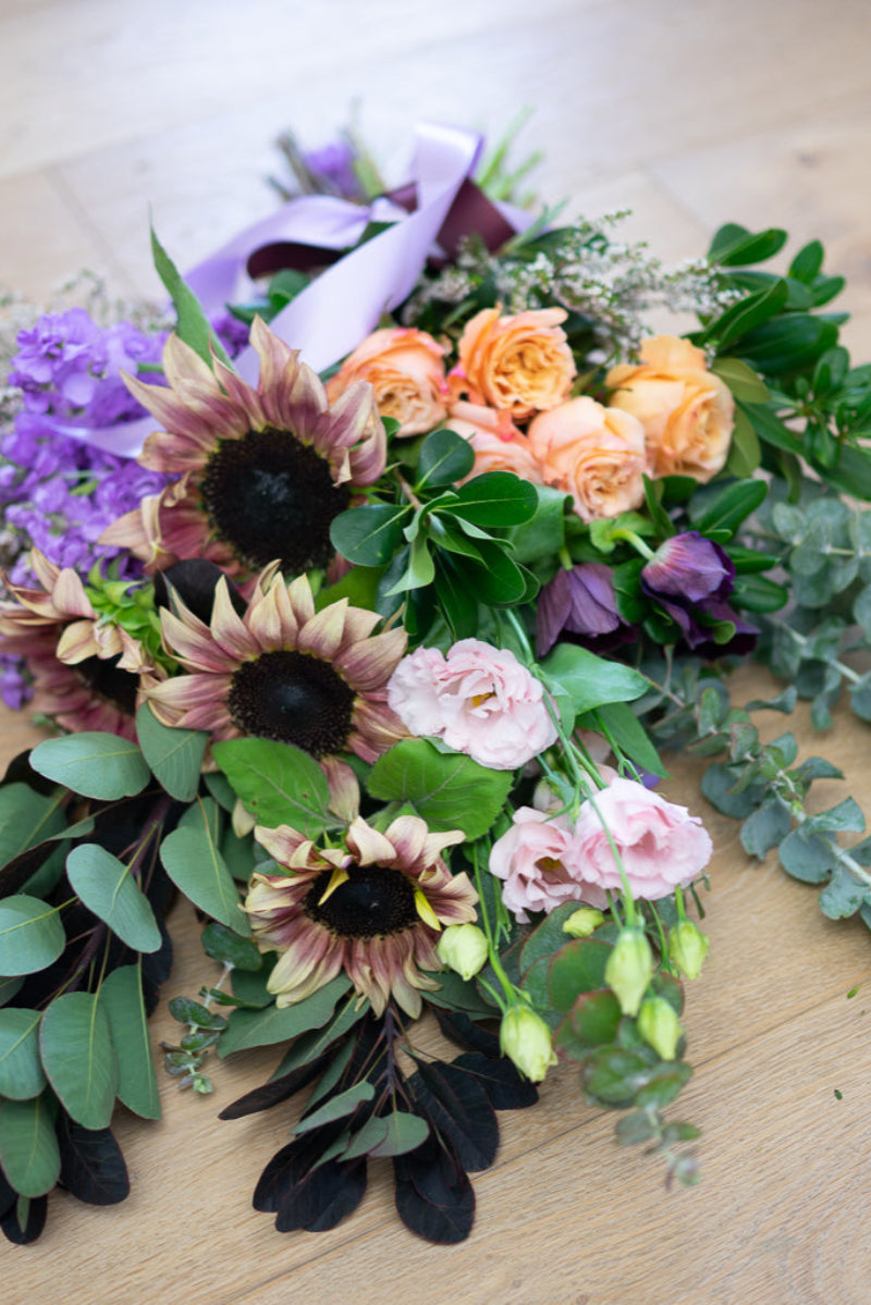 unvased-flowers-sunflowers-roses-eucalyptus