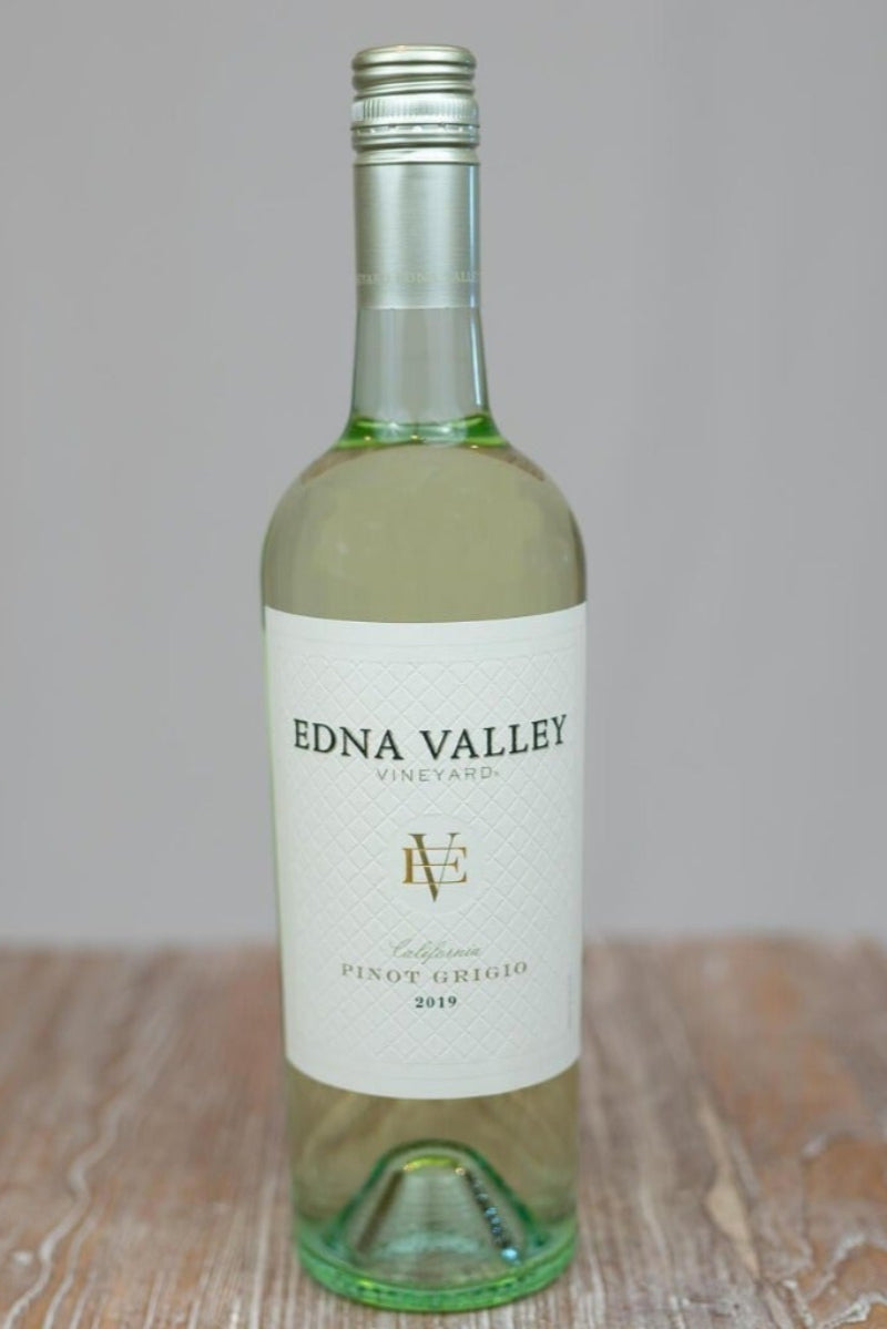 White wine Bottle for gifting with flower bouquets to make an extra special gift
