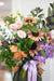huge bouquet of flowers being held